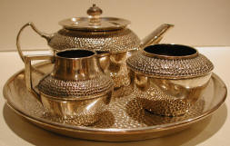 tea kettle, cream and sugar bowls, & tray